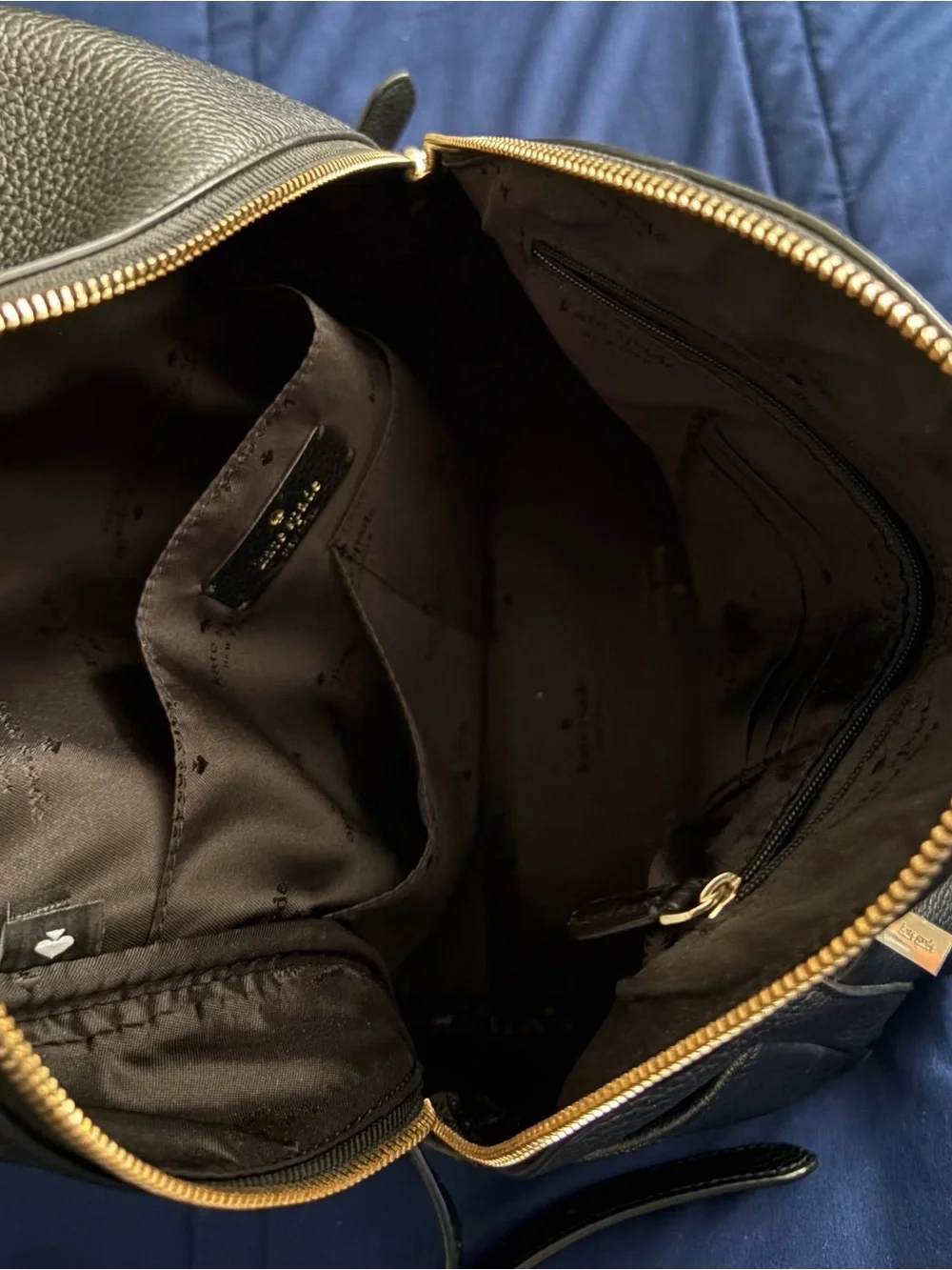 kate spade black pebbled leather backpack with gold accents